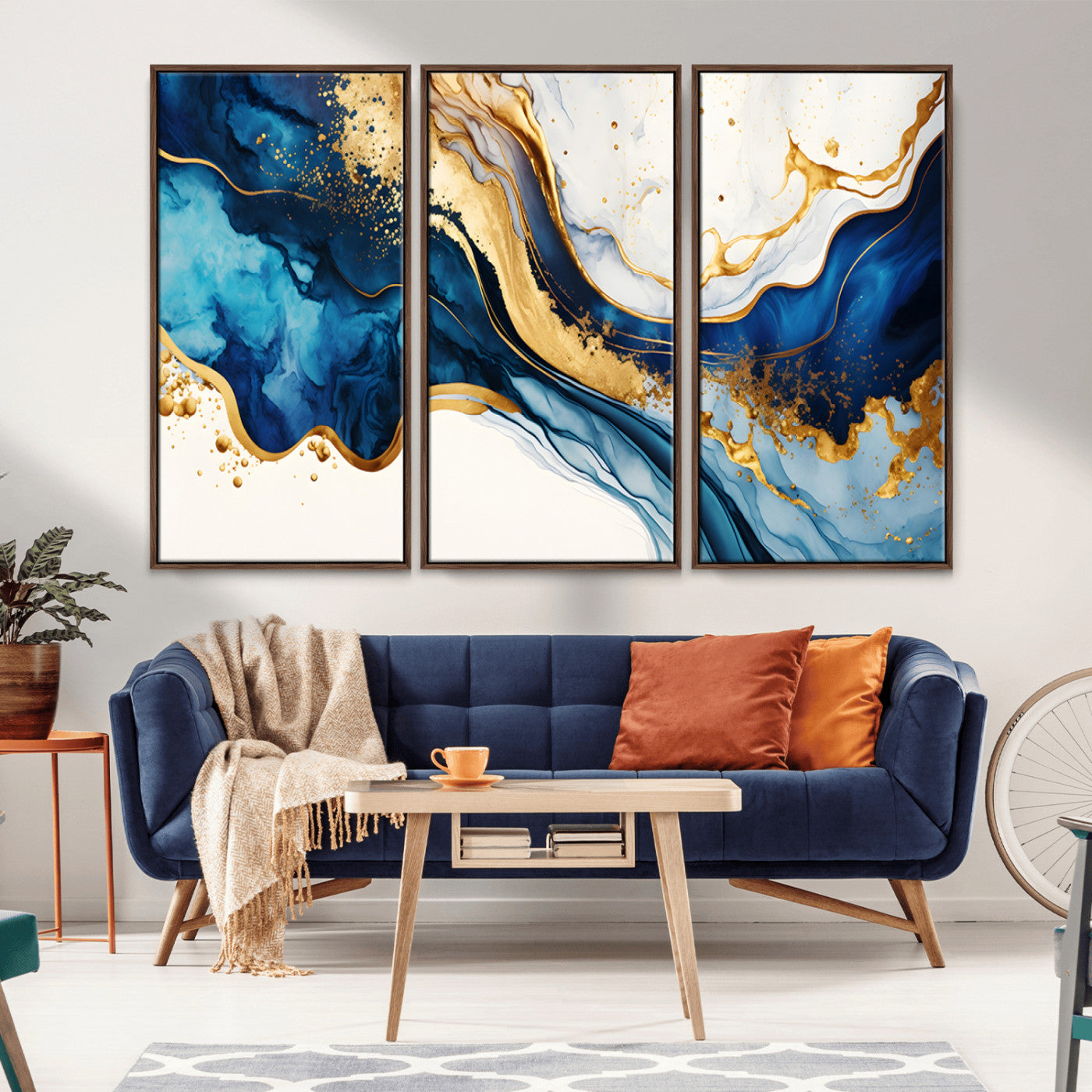 Canvas artwork with fluid blue and gold marbling, perfect for modern luxe or elegant abstract home decor styles.