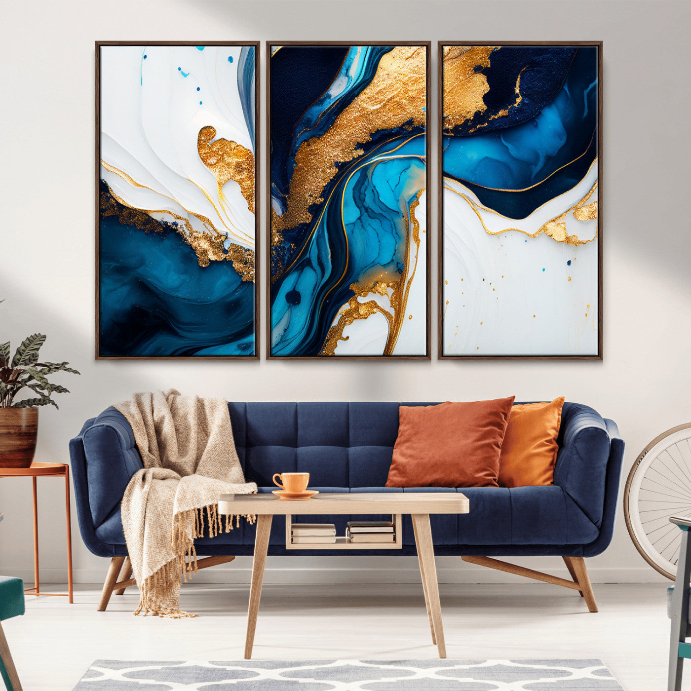 Luxurious abstract canvas in gold, navy, and teal tones with fluid marble patterns, perfect for modern glam or upscale interiors.