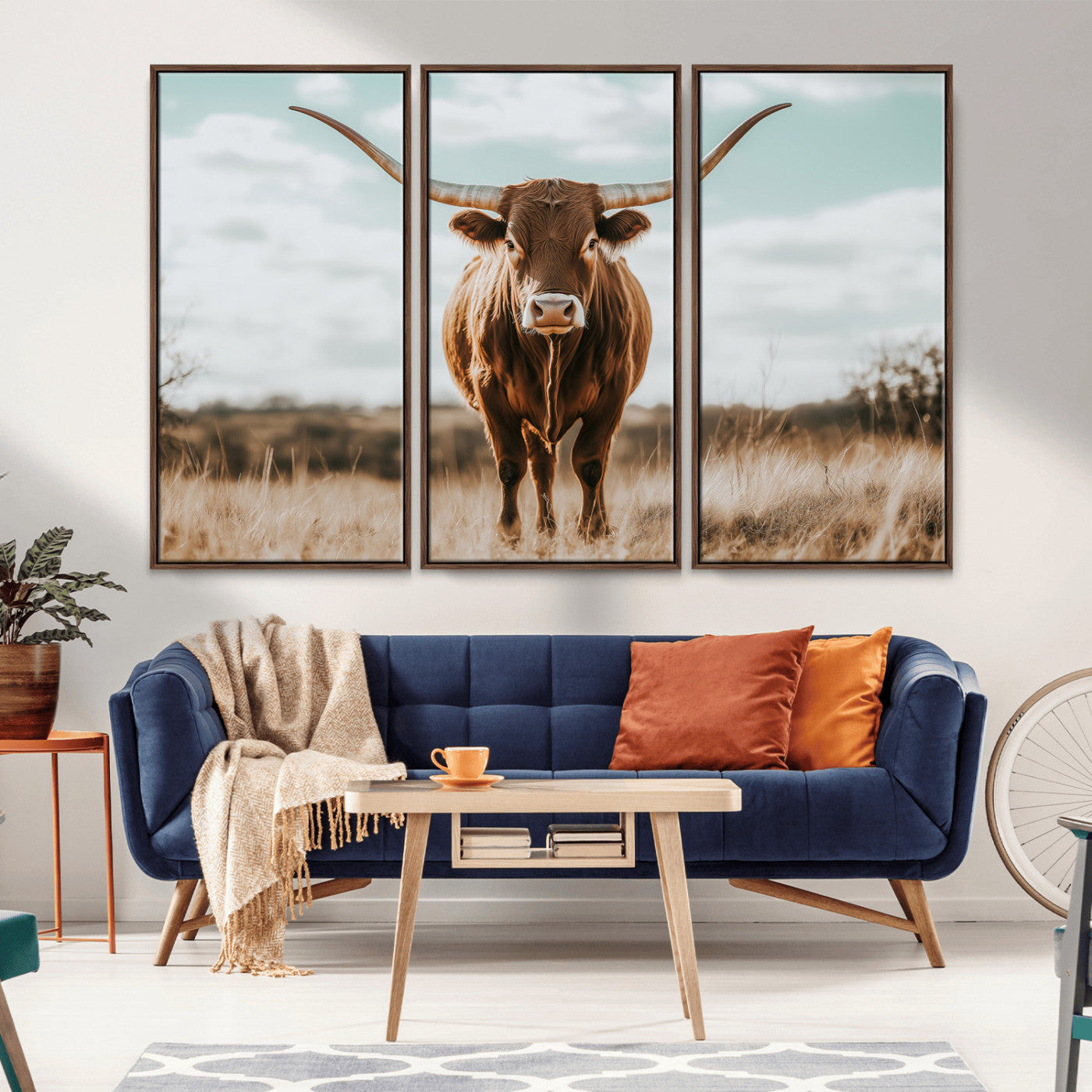 Texas Longhorn standing in a golden prairie under soft skies, ideal for rustic or western-style decor with warm natural tones.