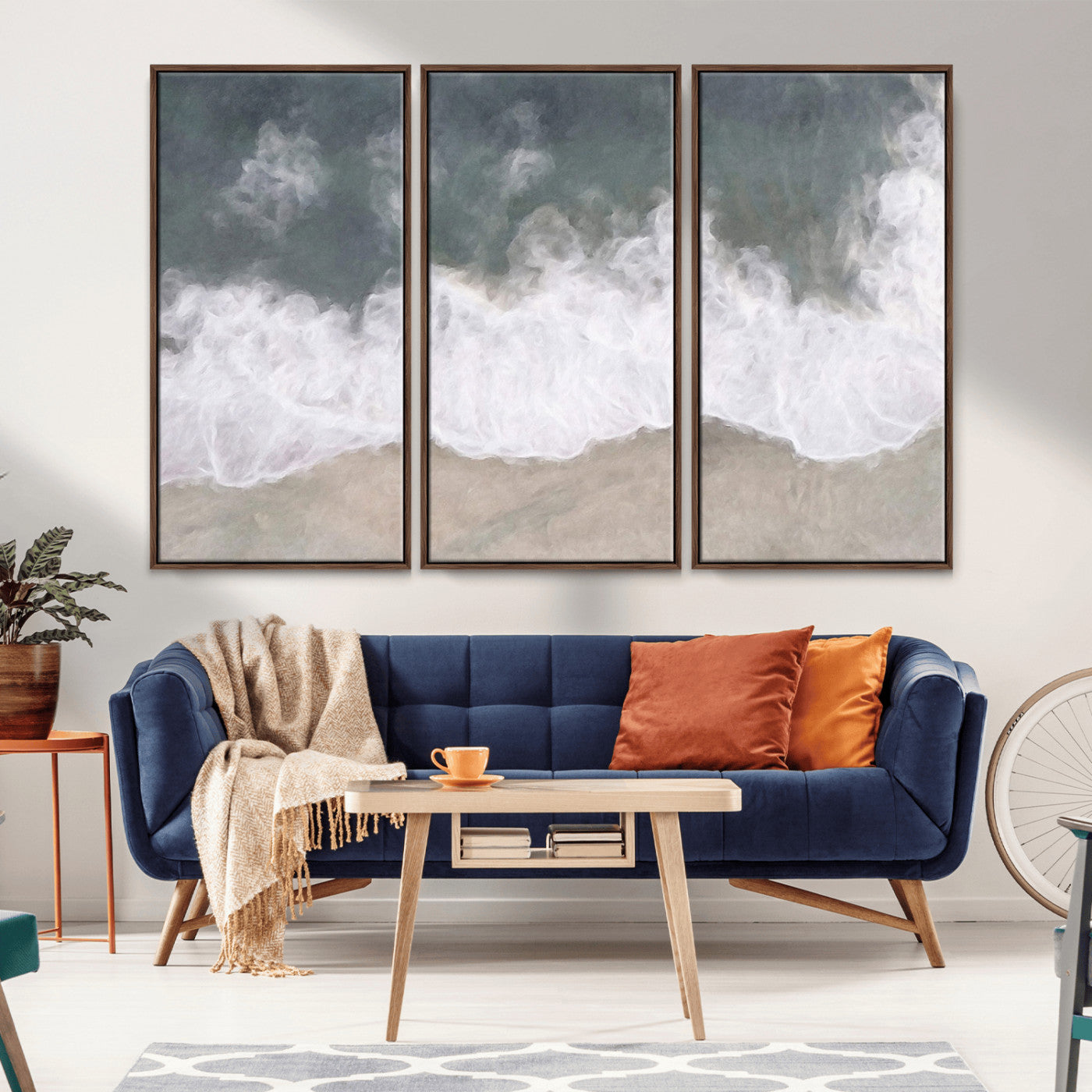 Wall art canvas print featuring foamy ocean waves softly rolling onto a sandy shore with a dreamy, painterly texture.