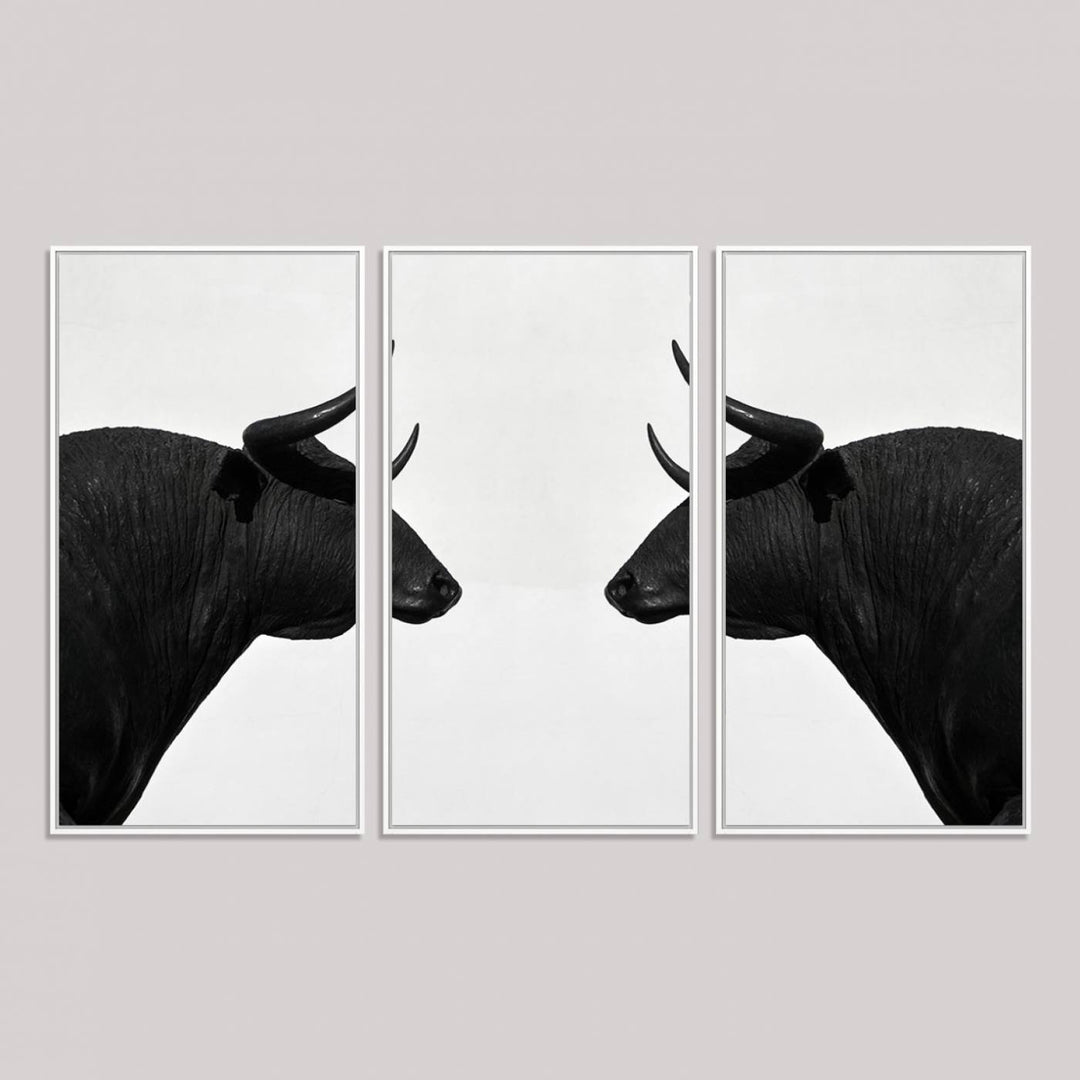 Spanish Bull Wall Art Canvas Print: Two black bull heads facing off on museum-quality canvas.