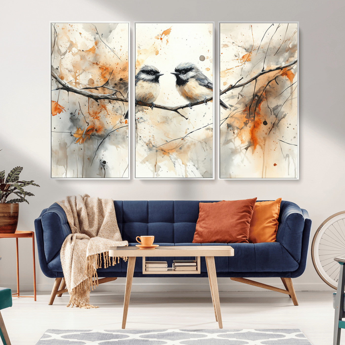 A soft and elegant watercolor painting of two chickadees perched on a delicate branch, surrounded by splashes of orange and neutral tones evoking a calm autumn day.
