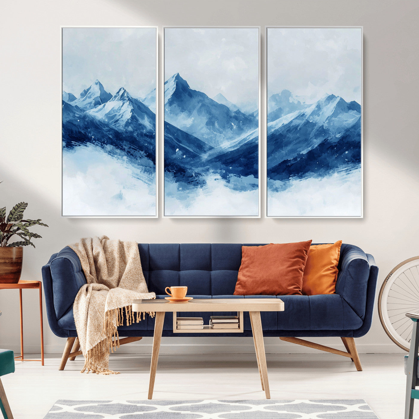 Peaceful watercolor-style painting of snowy blue mountains in soft tones, perfect for winter-themed or minimalist wall decor.