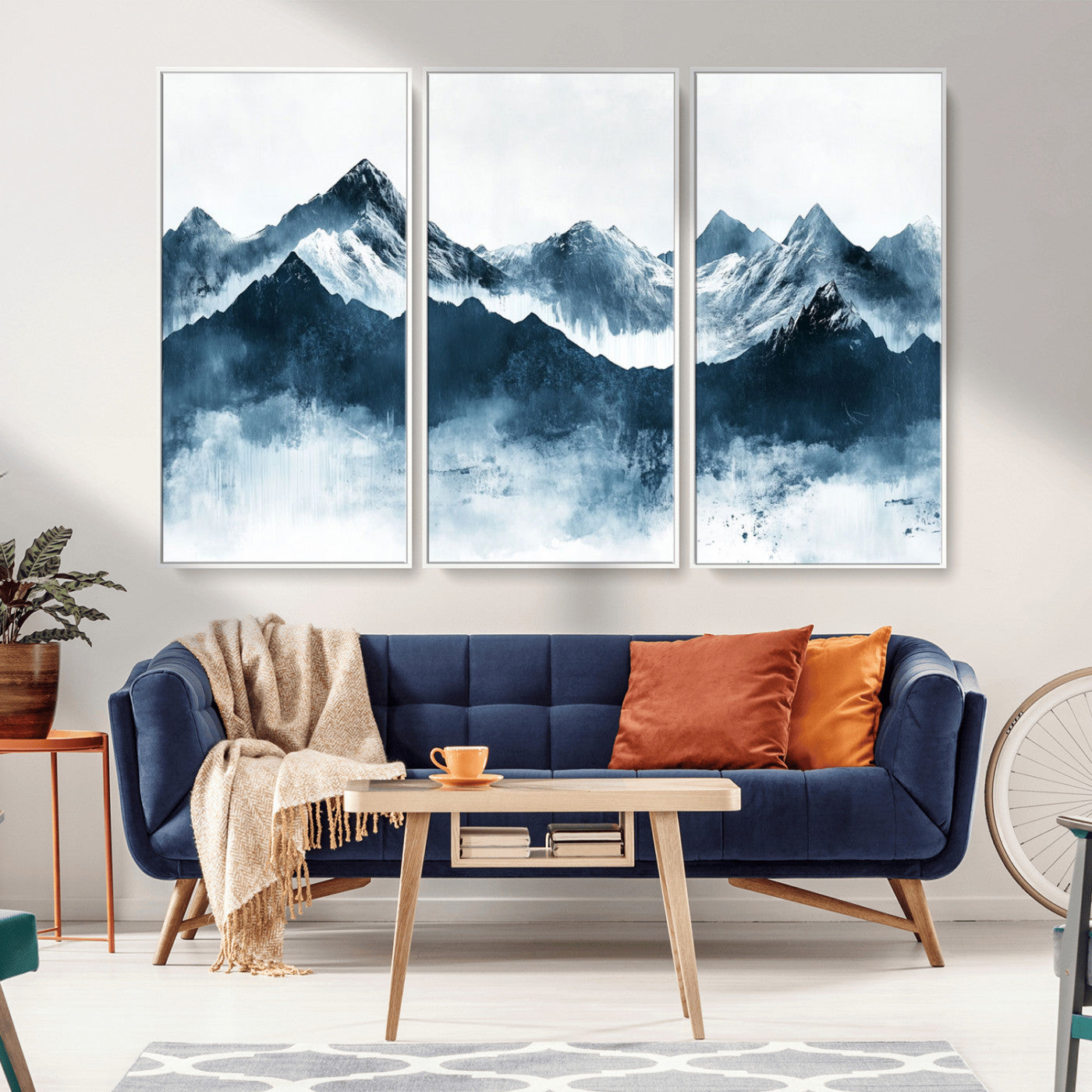 Abstract blue-toned canvas of snowy mountains in misty tones, ideal for minimalist or moody alpine-inspired home decor.