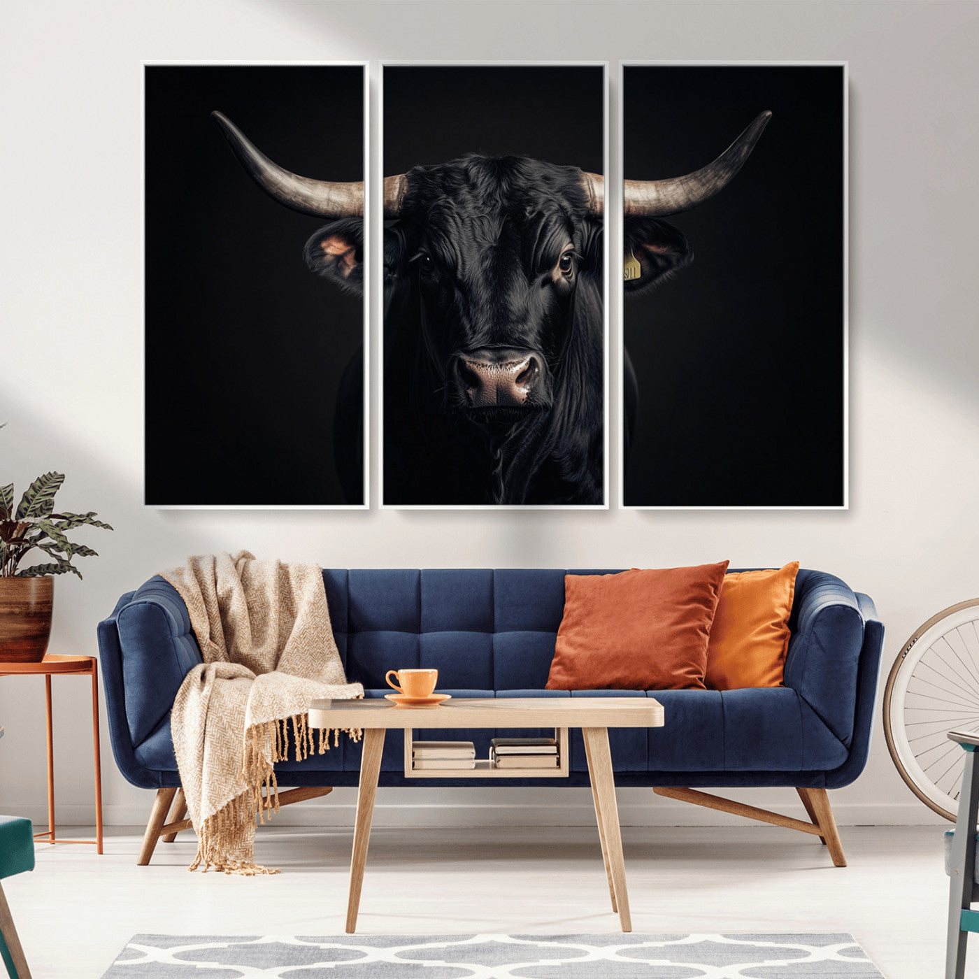 Canvas featuring a black horned bull in moody lighting on a dark background, perfect for western or rustic farmhouse-style home decor.
