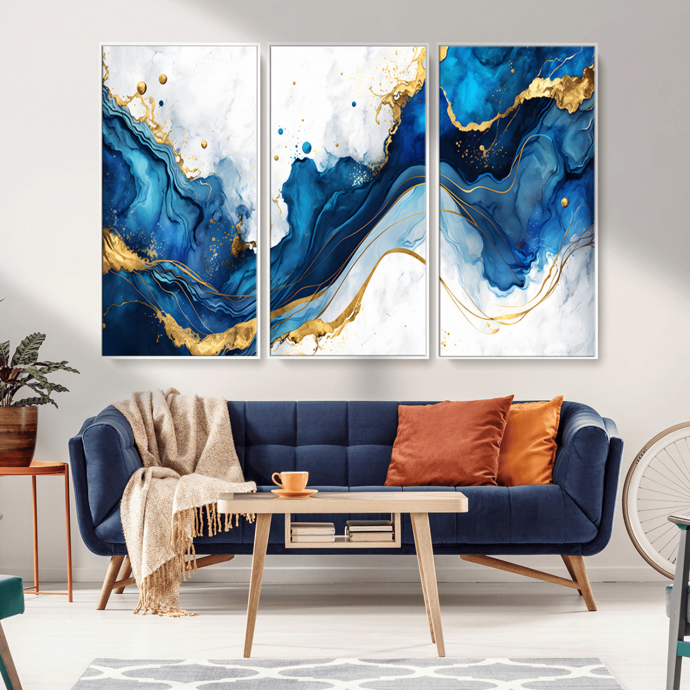 Elegant abstract canvas in cobalt blue and gold tones, featuring marble waves and fluid motion, ideal for luxe interior styling.