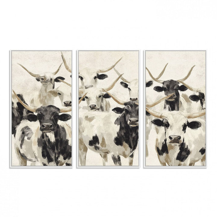 Canvas print titled Longhorn Texas Cow Drawing, depicting longhorn cattle with black and white markings, made in the USA, displayed on the wall.