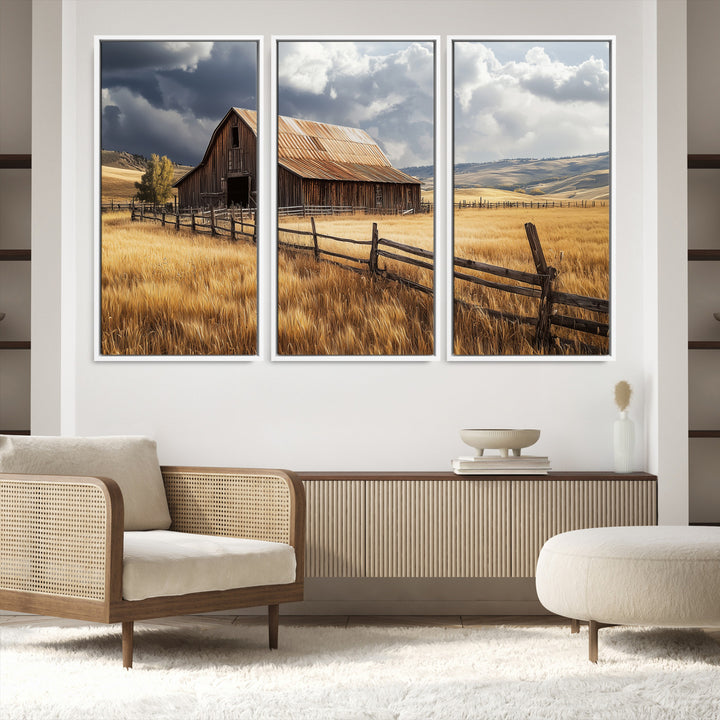 Canvas of a weathered wooden barn in a golden field under a dramatic sky, perfect for rustic or farmhouse-style wall decor.