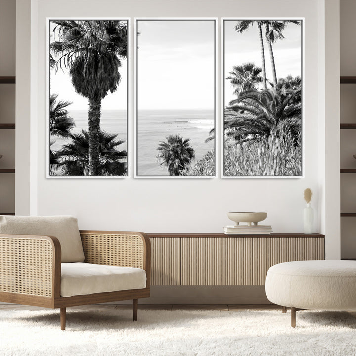 Monochrome canvas of palm trees framing a coastal surf scene, perfect for California-inspired or retro black-and-white beach decor.