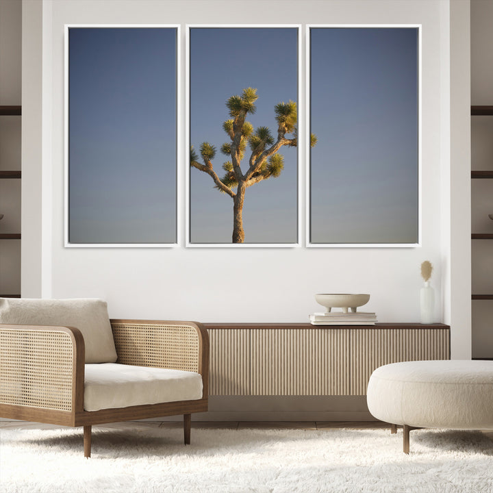 A lone Joshua Tree standing against a deep blue sky, capturing the serene and rugged beauty of the Southwestern desert landscape.