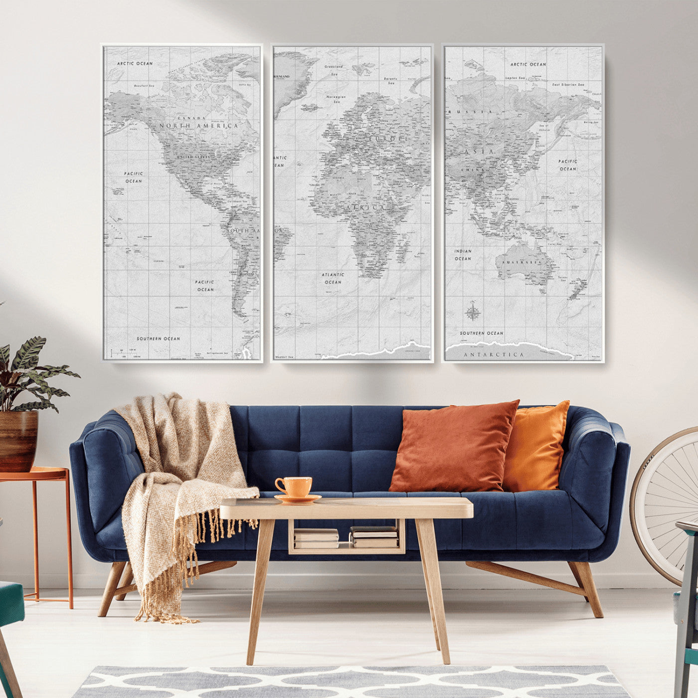 Grayscale vintage world map with detailed country borders, oceans, continents, and major cities on a textured parchment background.
