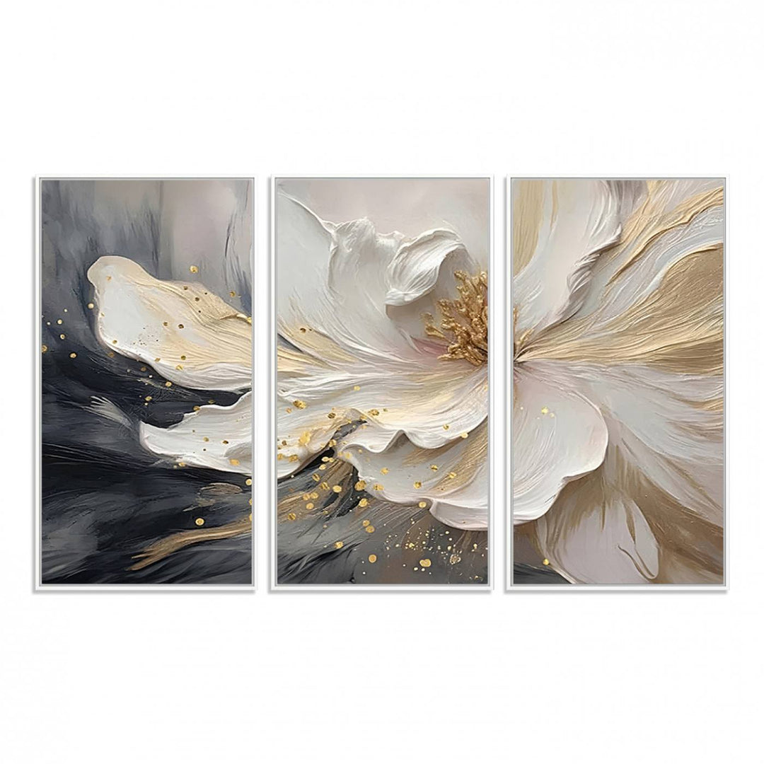 Elegant White and Gold Floral Triptych Canvas Art, a modern textured flower painting for home or office decor, features a blurred gray background.