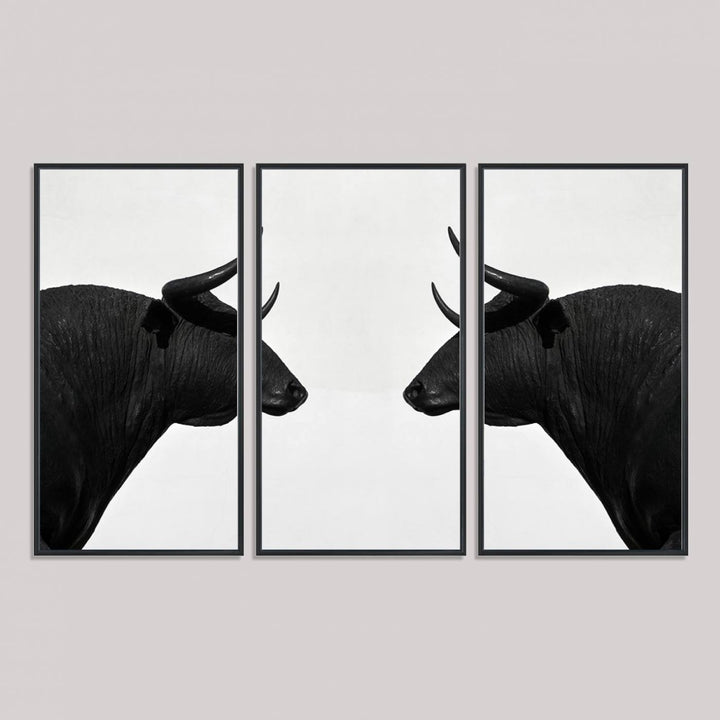 Spanish Bull Wall Art Canvas Print: Two black bull heads facing off on museum-quality canvas.