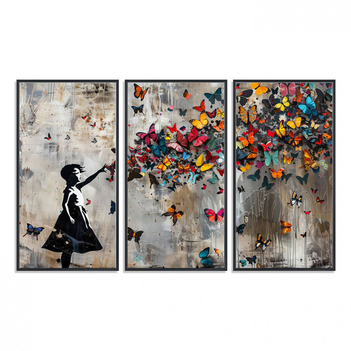 The Banksy Butterfly Girl 3-Piece Modern Graffiti Canvas Wall Art features a silhouette of a girl reaching for butterflies.