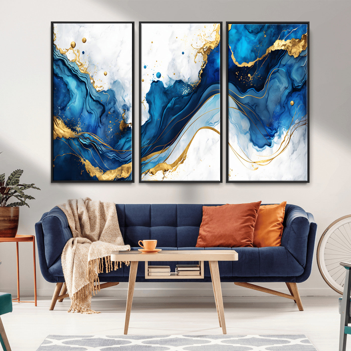 Elegant abstract canvas in cobalt blue and gold tones, featuring marble waves and fluid motion, ideal for luxe interior styling.