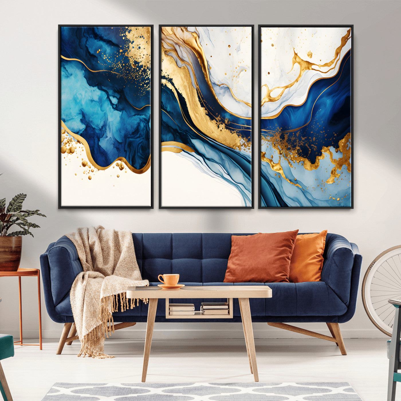 Canvas artwork with fluid blue and gold marbling, perfect for modern luxe or elegant abstract home decor styles.