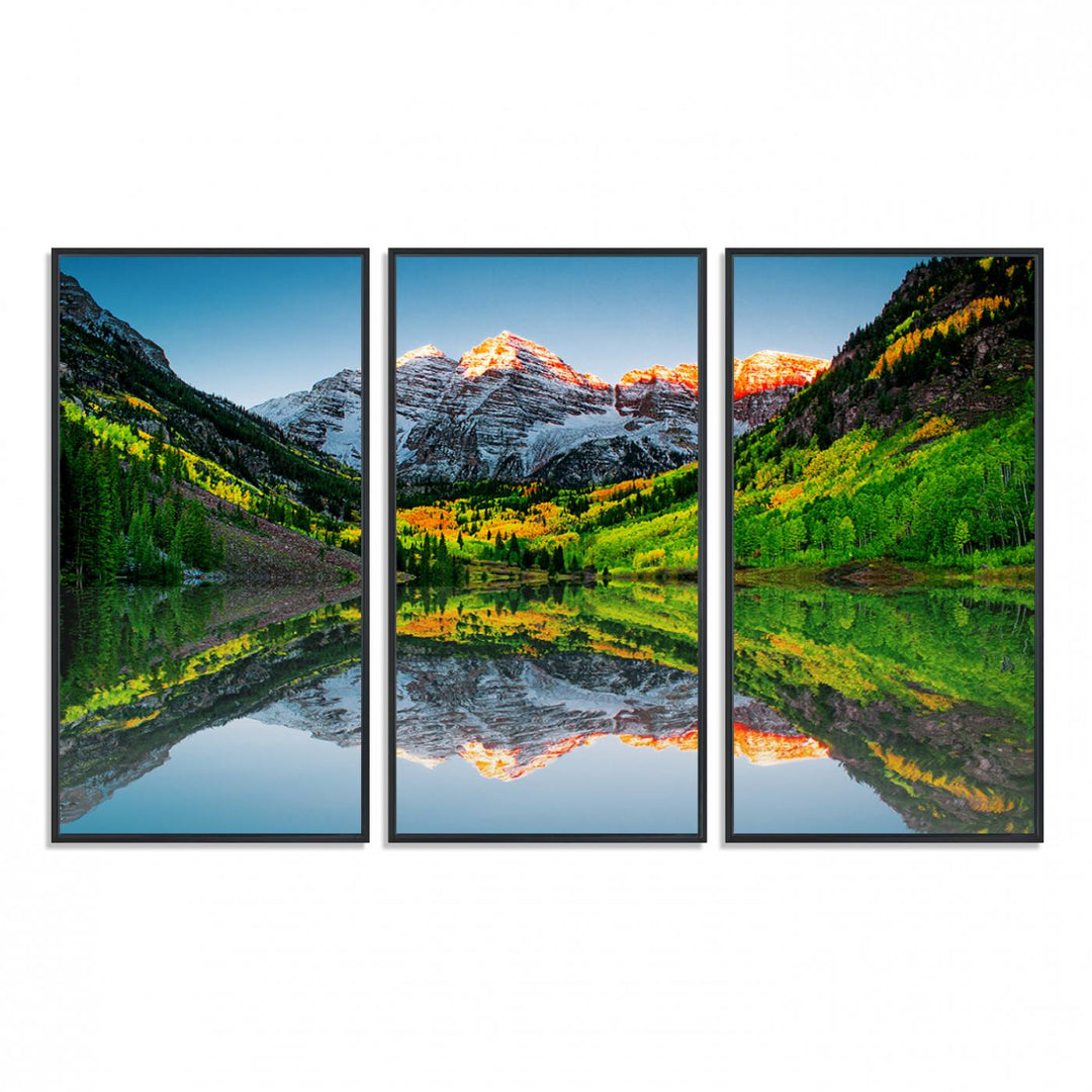 The Sunrise Maroon Bells Lake Wall Art Print beautifully captures North Maroon Peak mirrored in the tranquil lake, framed by lush greenery.