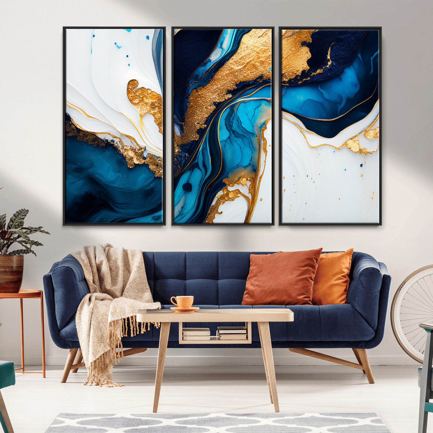 Luxurious abstract canvas in gold, navy, and teal tones with fluid marble patterns, perfect for modern glam or upscale interiors.