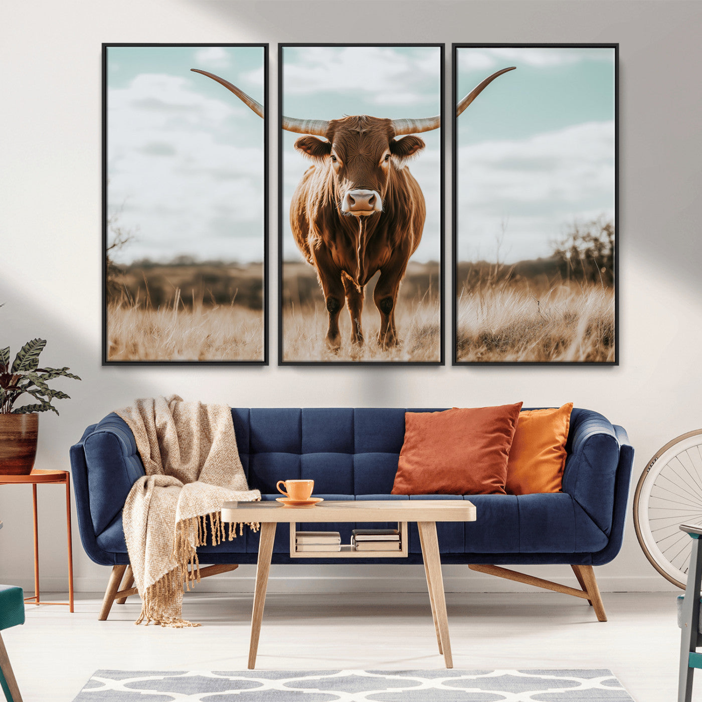 Texas Longhorn standing in a golden prairie under soft skies, ideal for rustic or western-style decor with warm natural tones.