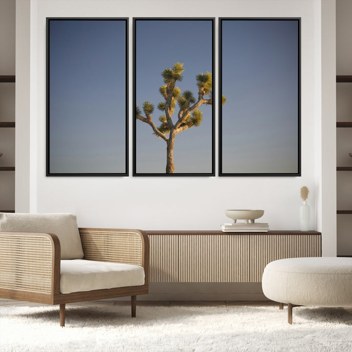 A lone Joshua Tree standing against a deep blue sky, capturing the serene and rugged beauty of the Southwestern desert landscape.