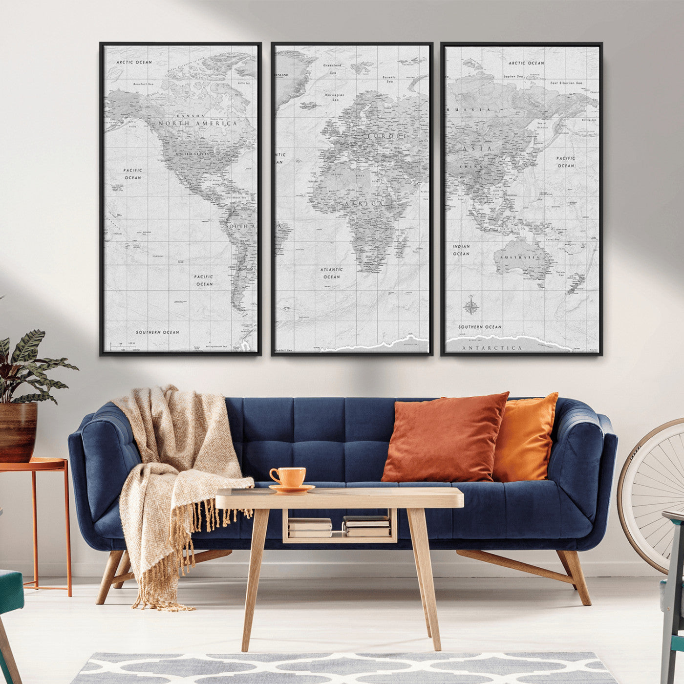 Grayscale vintage world map with detailed country borders, oceans, continents, and major cities on a textured parchment background.