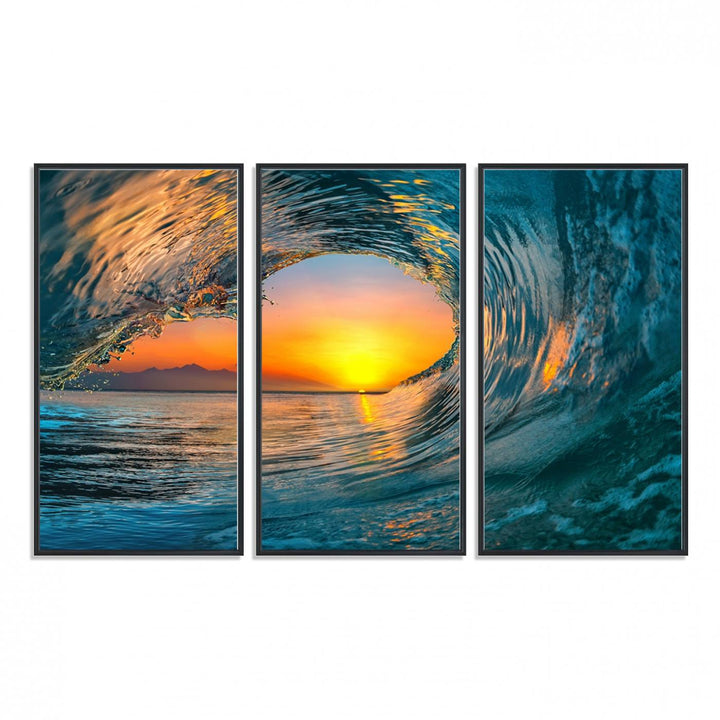 The Ocean Wave Sunset Wall Art canvas print features a vibrant ocean wave at sunset, forming a tunnel with silhouetted mountains.