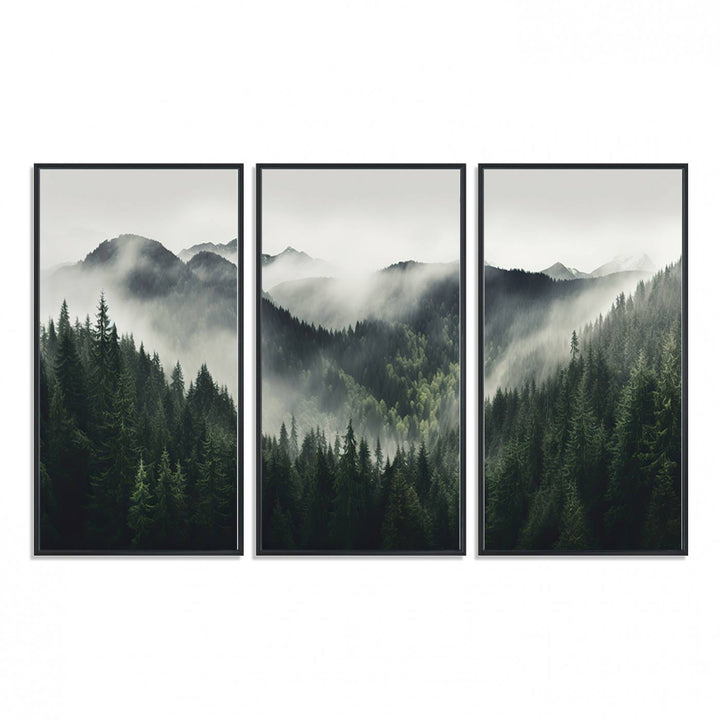 The Misty Forest Canvas Print Wall Art captures a serene misty forest scene with fog and mountains.