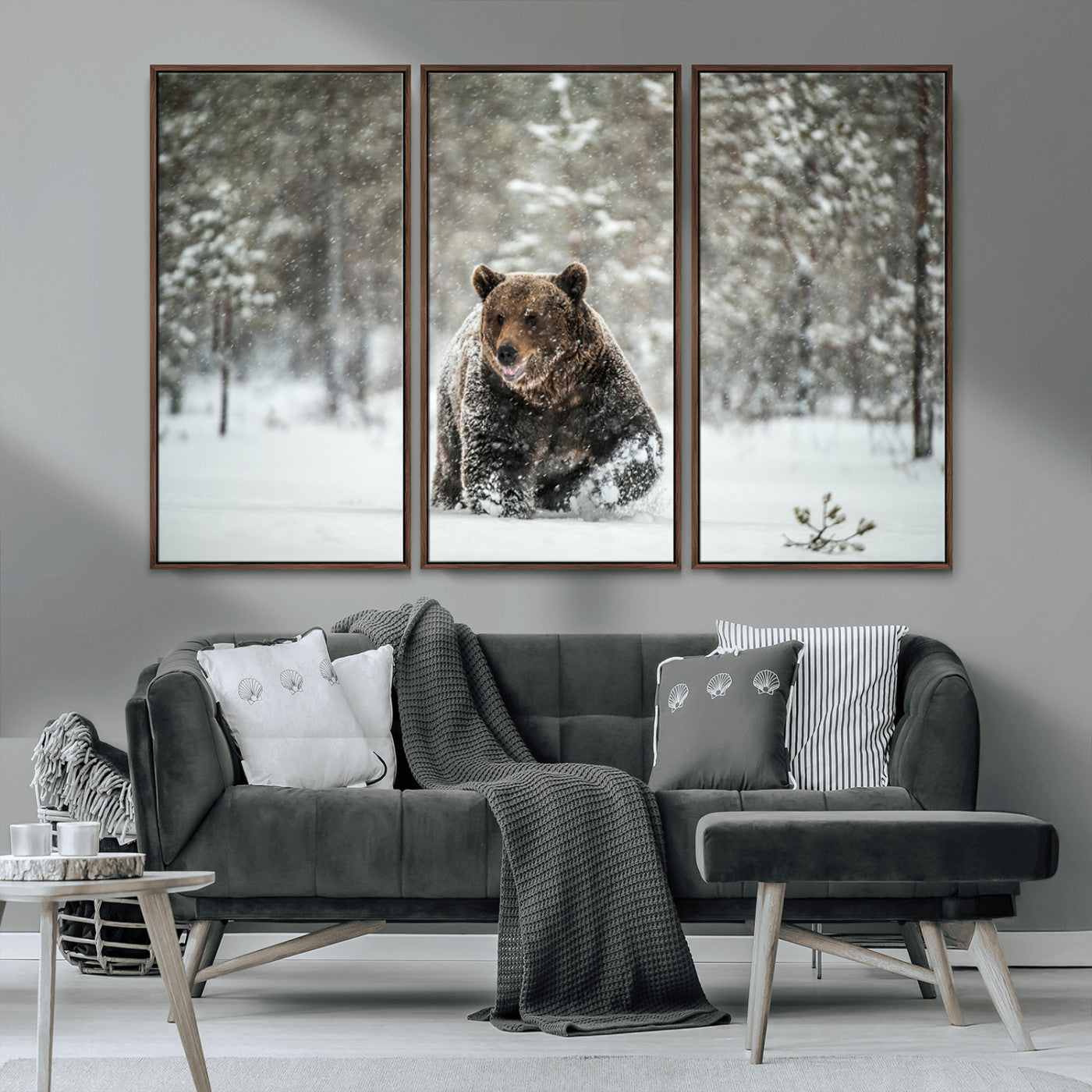 A majestic brown bear moves through a snowy forest landscape, surrounded by falling snowflakes, capturing the essence of wildlife in winter.