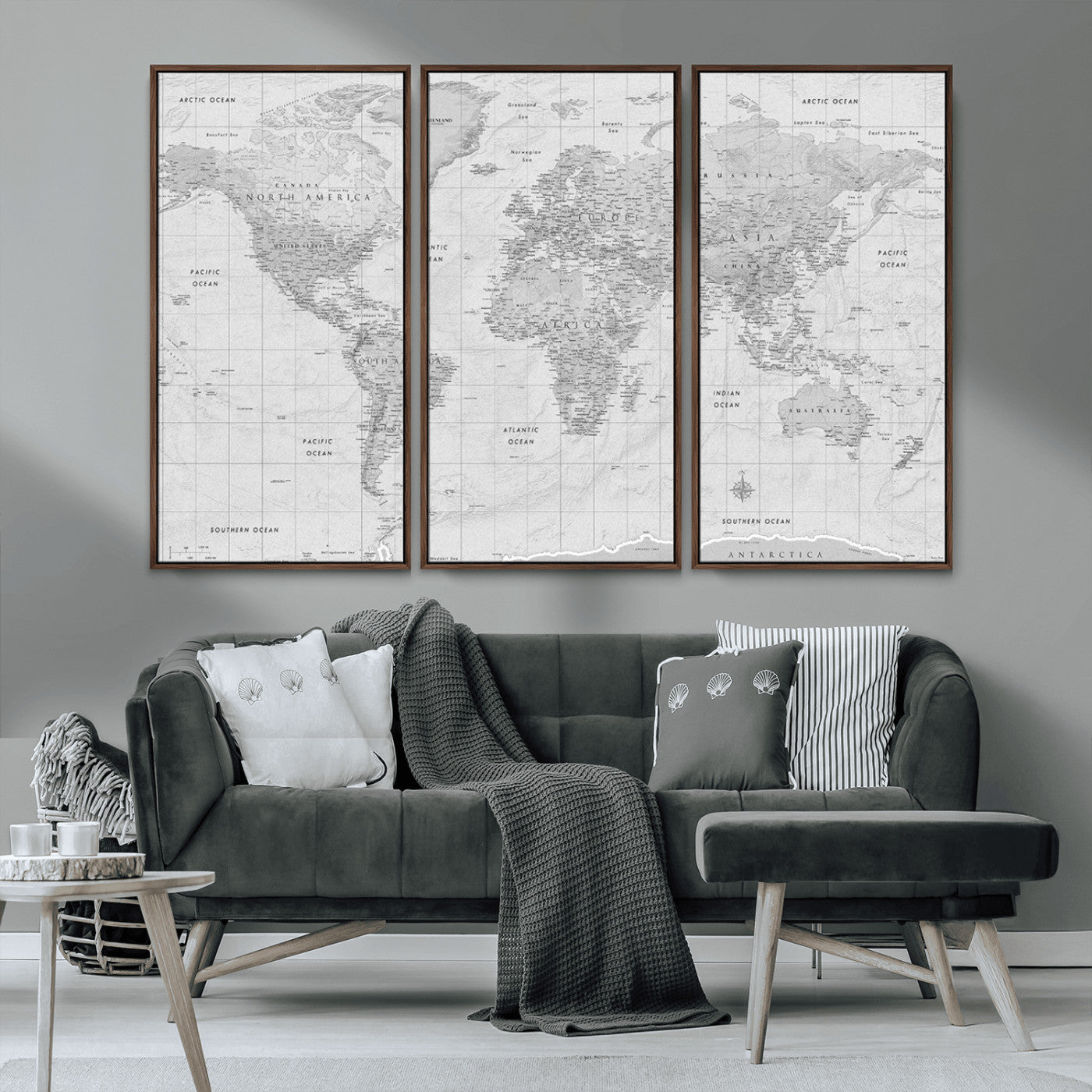 Grayscale vintage world map with detailed country borders, oceans, continents, and major cities on a textured parchment background.