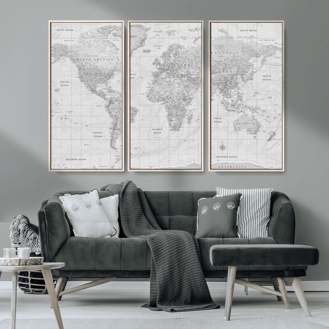 Grayscale vintage world map with detailed country borders, oceans, continents, and major cities on a textured parchment background.