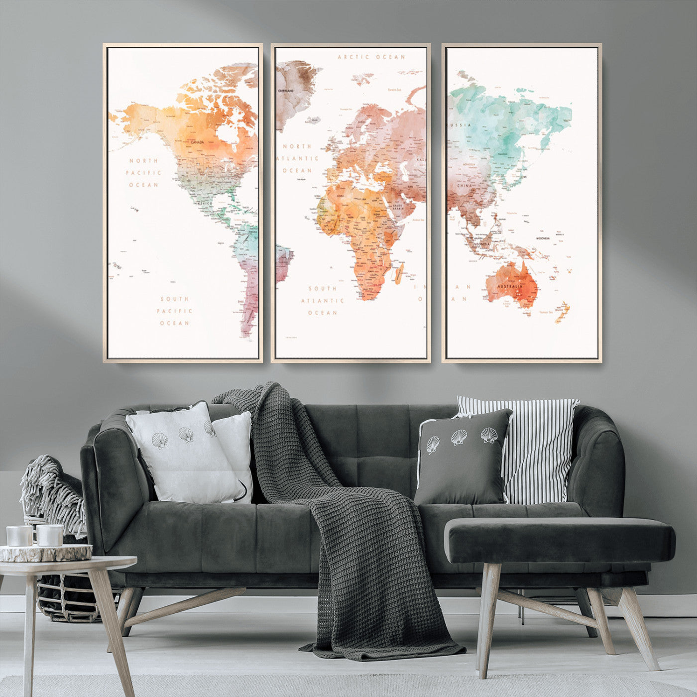 Watercolor world map featuring soft pastel hues in orange, green, blue, and purple on a light background, printed on canvas for vibrant and artistic wall decor.