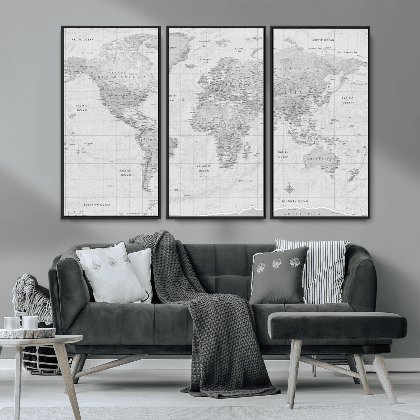 Grayscale vintage world map with detailed country borders, oceans, continents, and major cities on a textured parchment background.