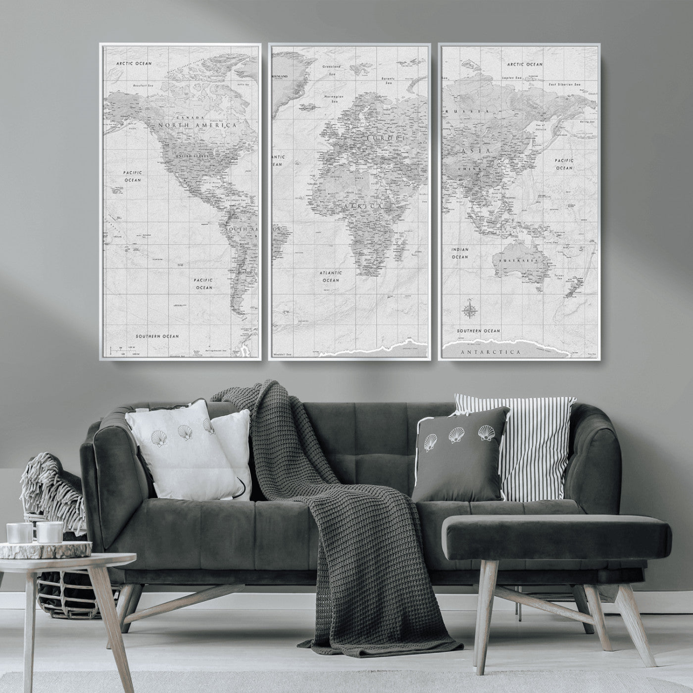 Grayscale vintage world map with detailed country borders, oceans, continents, and major cities on a textured parchment background.