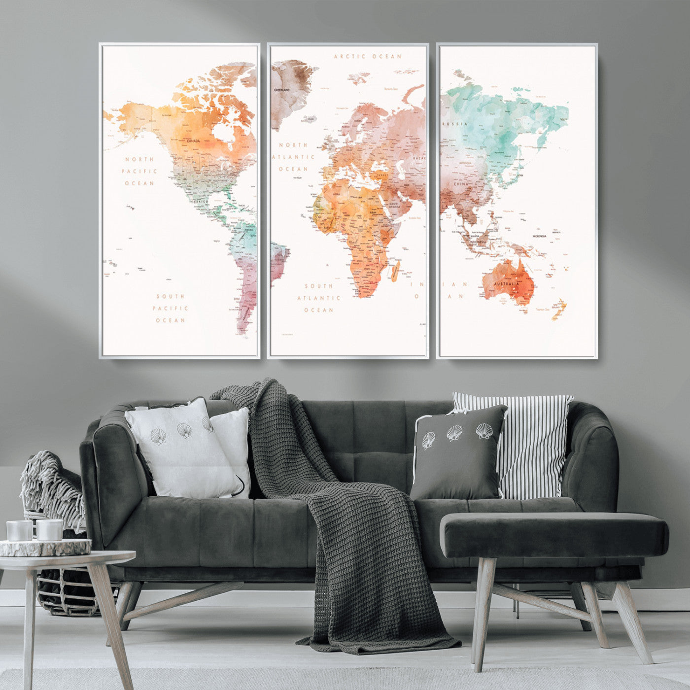 Watercolor world map featuring soft pastel hues in orange, green, blue, and purple on a light background, printed on canvas for vibrant and artistic wall decor.
