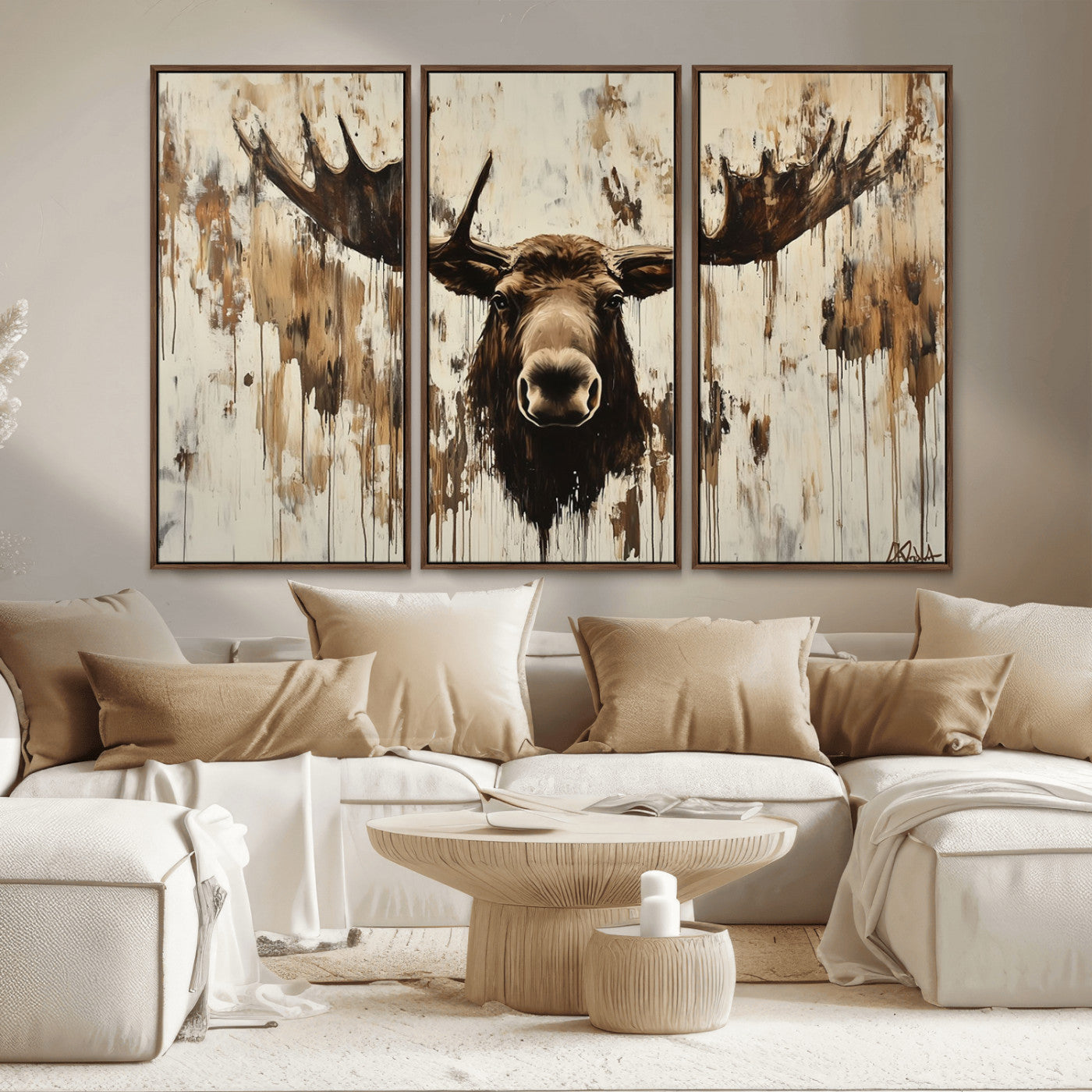 Expressive painting of a moose head with wide antlers in dark brown and beige tones, featuring paint drips and splatters on a light textured background, creating a striking rustic wall art canvas.