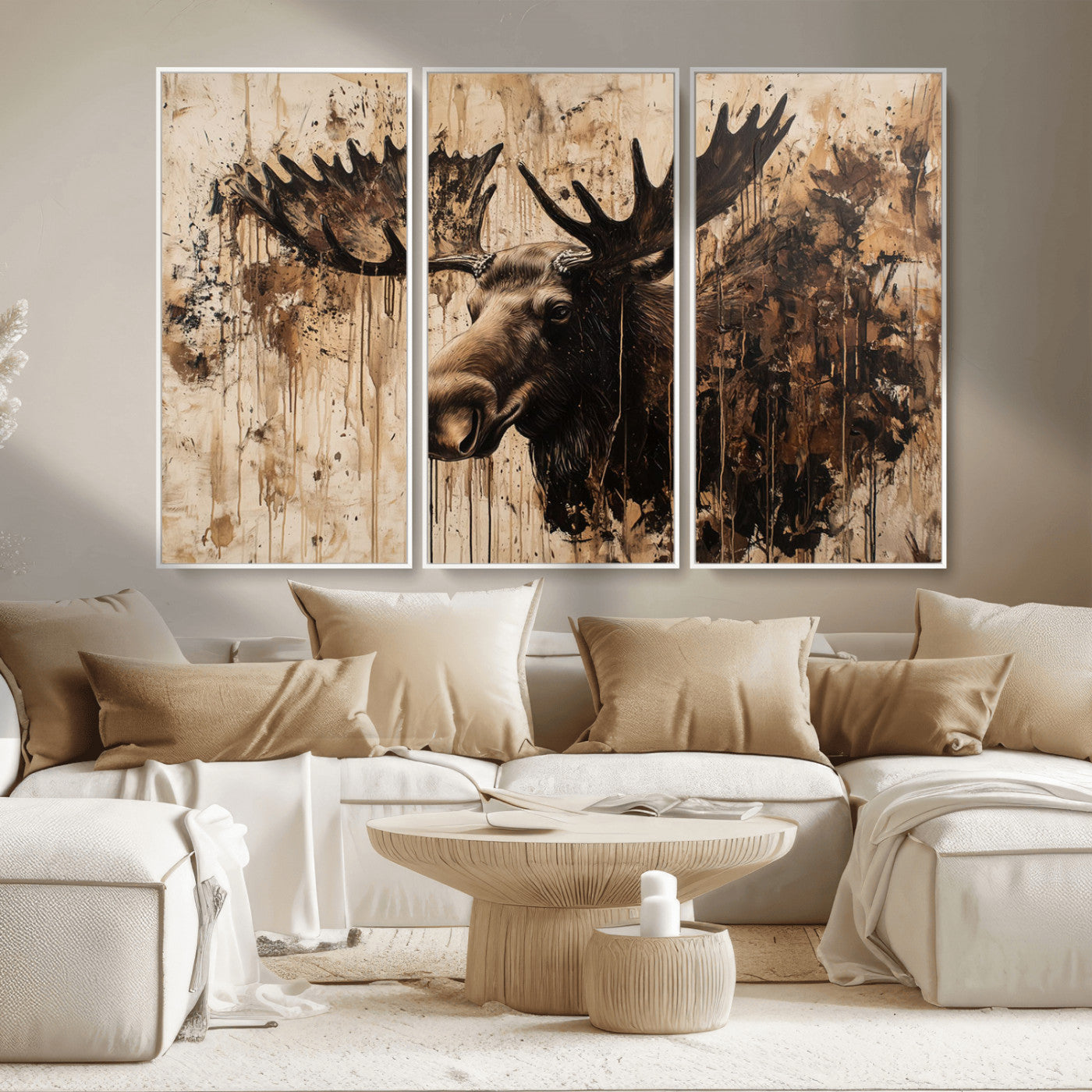 Artistic painting of a moose head with large antlers in shades of brown and black, with paint splatters and drips on a beige textured background, creating a rustic and expressive wall art canvas.
