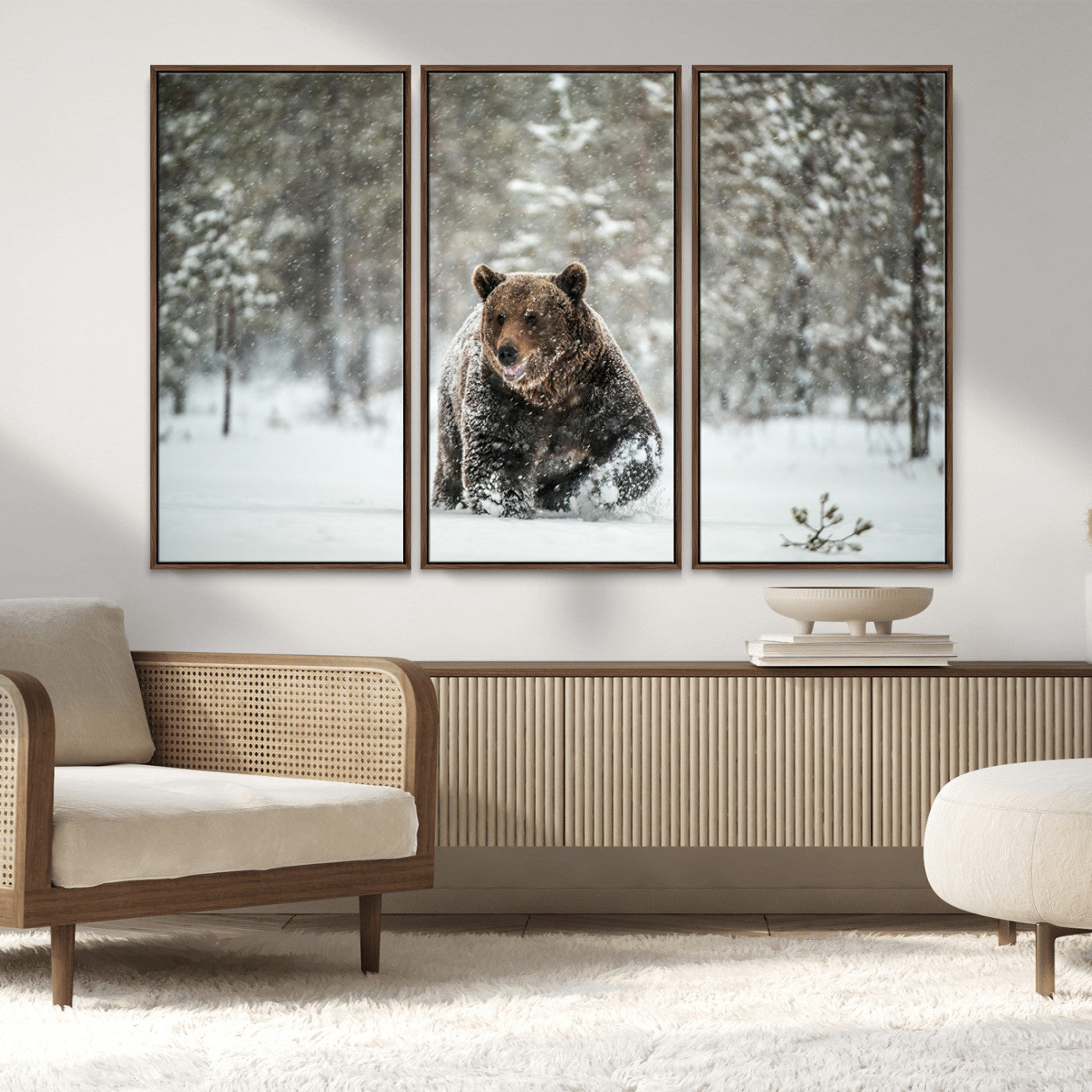 A majestic brown bear moves through a snowy forest landscape, surrounded by falling snowflakes, capturing the essence of wildlife in winter.