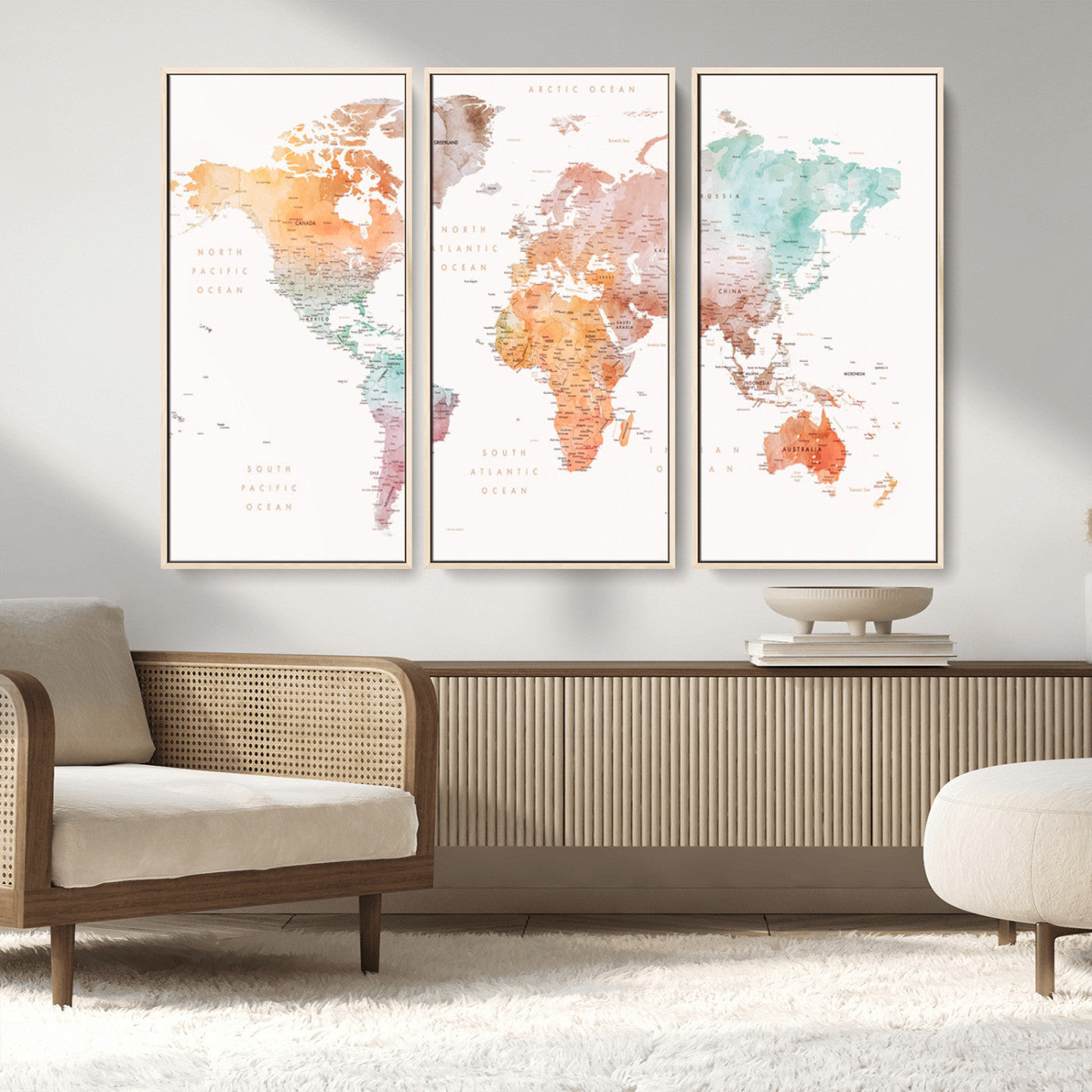 Watercolor world map featuring soft pastel hues in orange, green, blue, and purple on a light background, printed on canvas for vibrant and artistic wall decor.