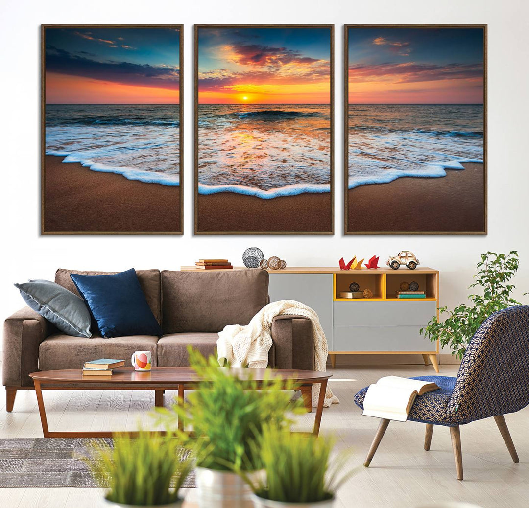 A Sunset with Calm Waves on the Beach Wall Art Canvas Print adorns the dining room.