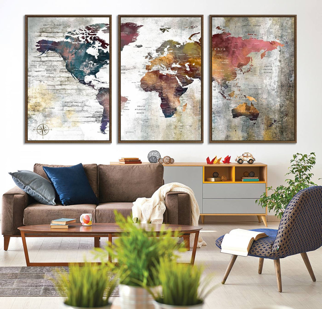 The World Map Wall Art Triptych: a 3-panel canvas featuring a vintage map.