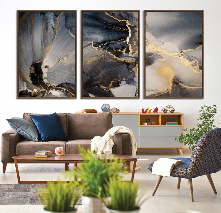 A Modern Marble Fluid Effect Abstract Wall Art with black, white, and gold swirls hangs in a modern kitchen.