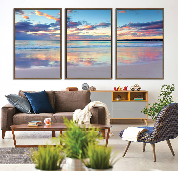 The Tranquil Pastel Sunset Beach Triptych Canvas Art hangs, showcasing its serene beauty.