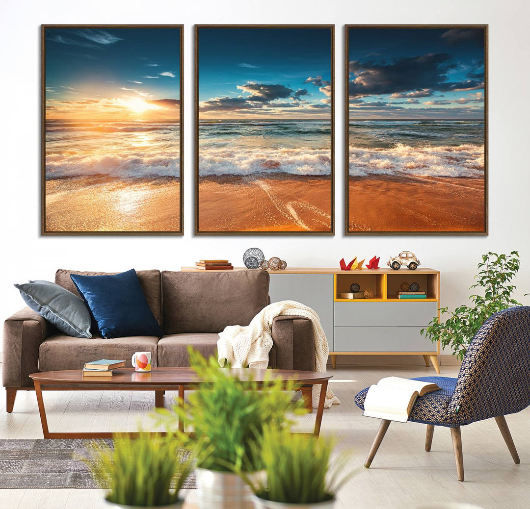 A Golden Sunset Beach Triptych Canvas Art hangs on a white wall.