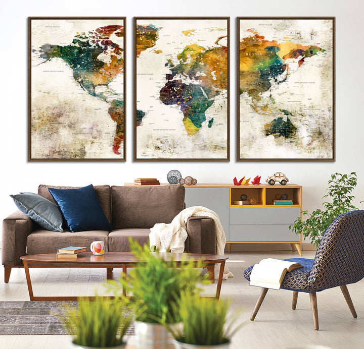 A 3-panel vintage world map canvas art is displayed.