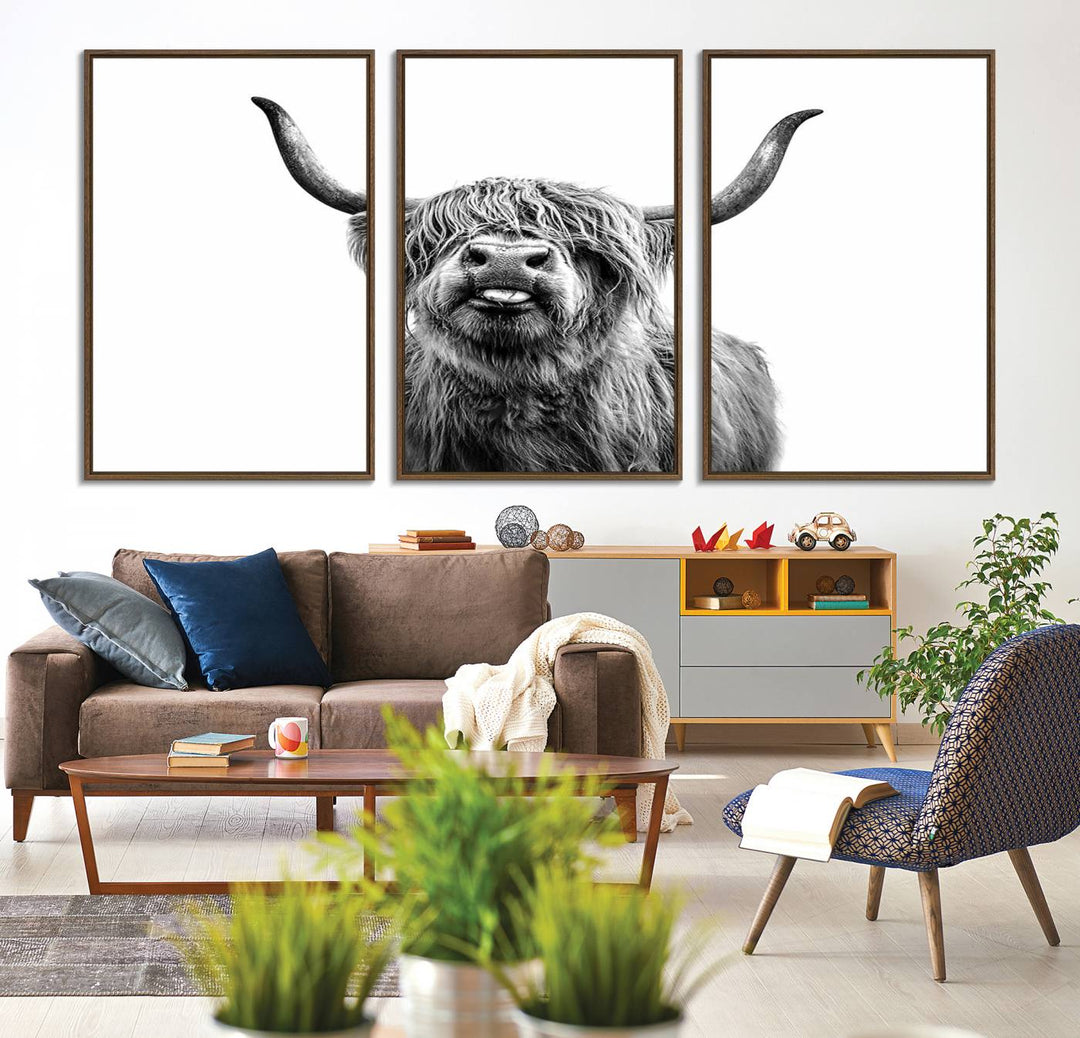 The Fanny Highland Cow art print decorates the modern kitchen, featured in black and white.