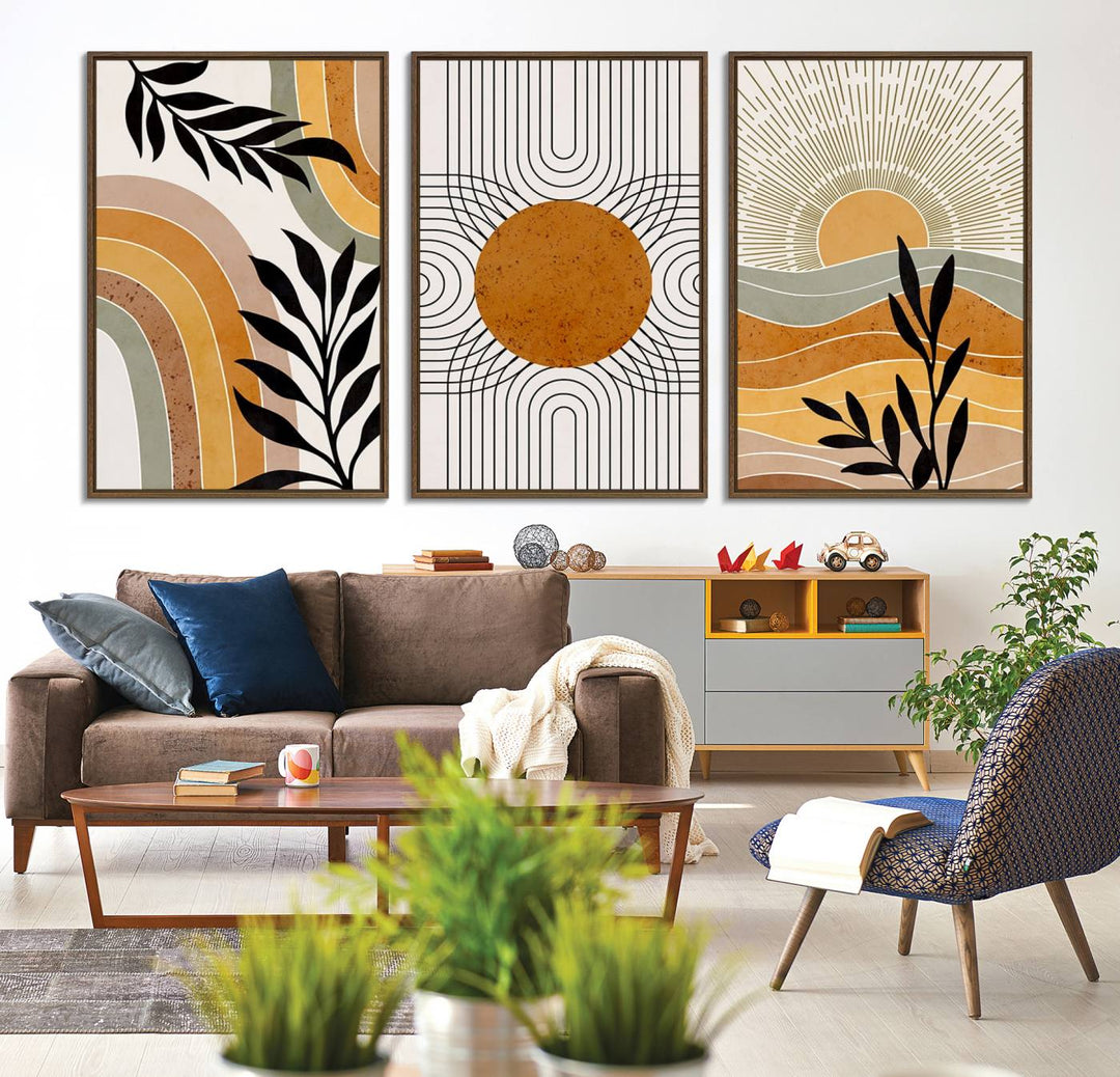 The Modern Boho Sun and Leaf giclée canvas is a 3-panel piece designed for mid-century or bohemian decor.