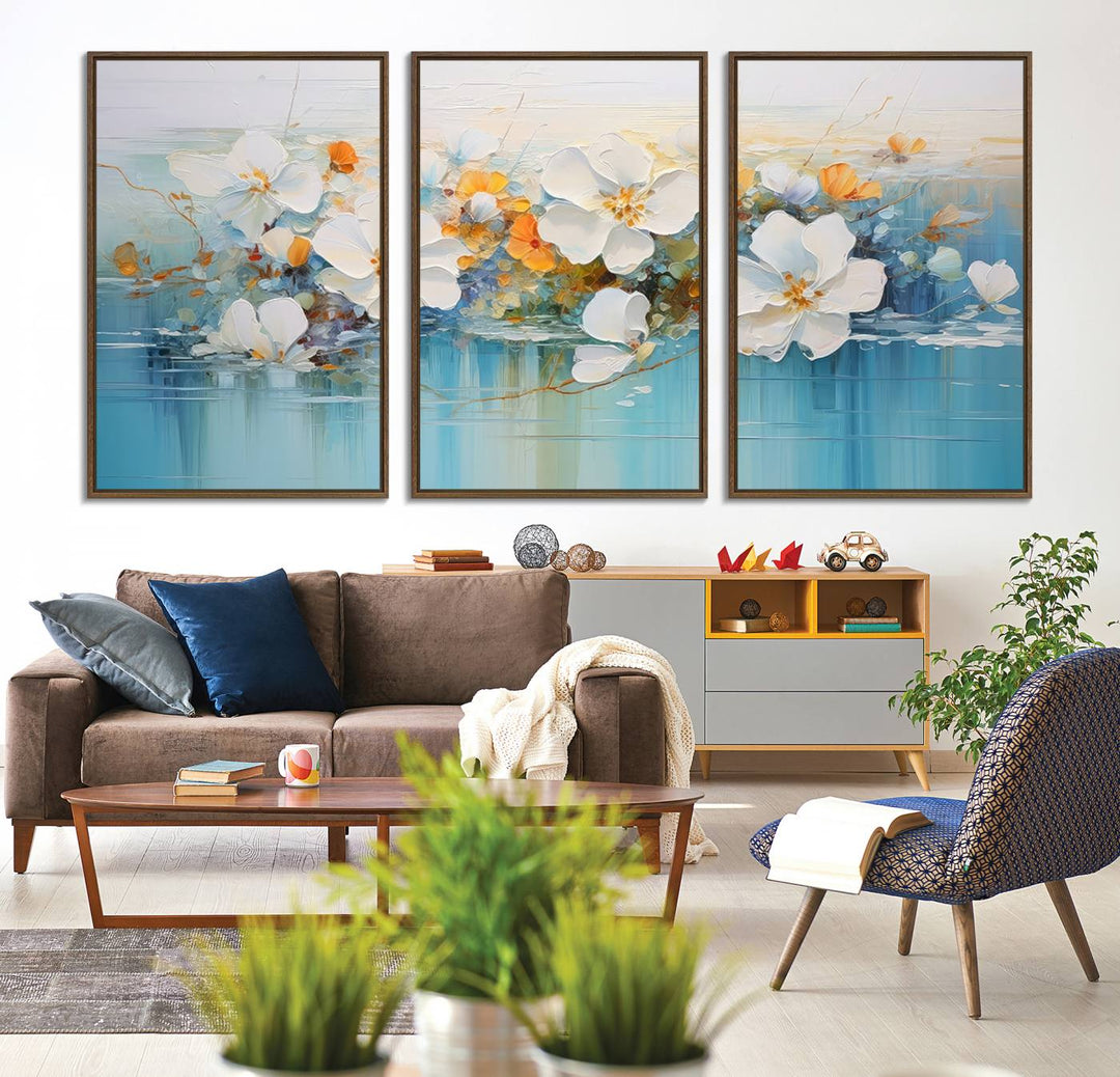 An Abstract Flower Wall Art Canvas Print in blue and orange hues.