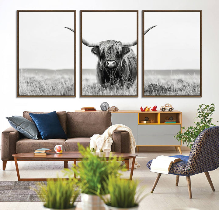 The Majestic Beauty canvas of a Highland cow adds elegance to the white walls as it hangs prominently.