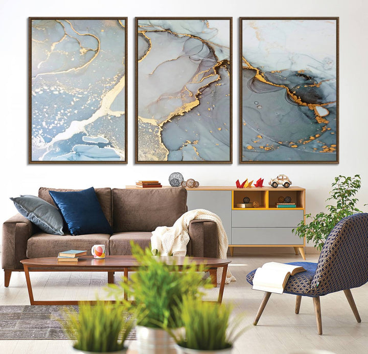 A blue and gold marbled Large Abstract Marble Wall Art Canvas Print hangs overhead.