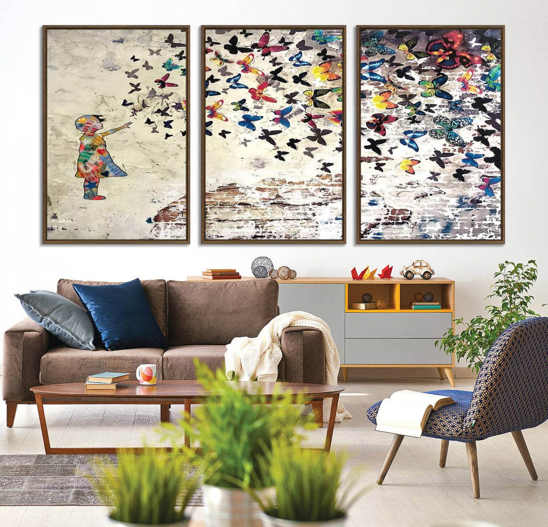 A Banksy Girl Butterfly Canvas Print is displayed on the textured wall.